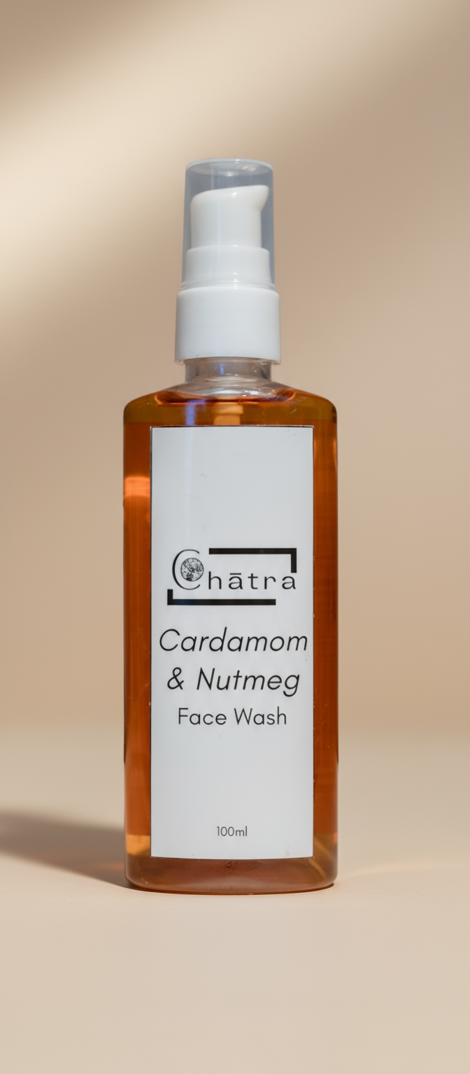 Bottle of Ceyon Organic House Cardamom & Nutmeg Face Wash on a beige background
