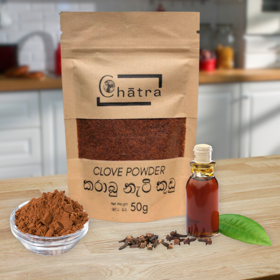 Ceylon Organic House Clove Powder pack on a kitchen counter with clove oil, clove pods and clove powder.