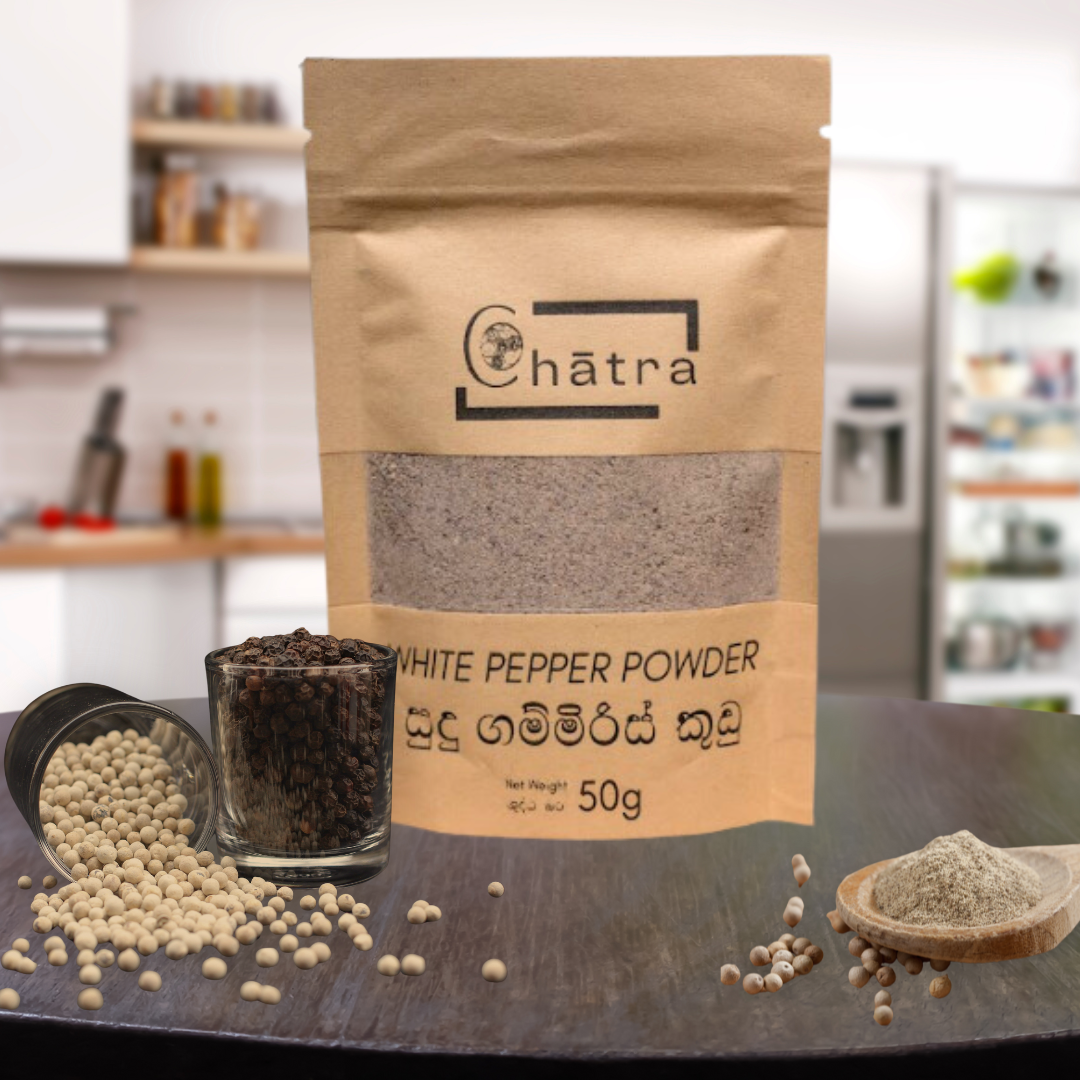 Ceylon Organic House White Pepper Powder pack on a countertop with black pepper and white pepper